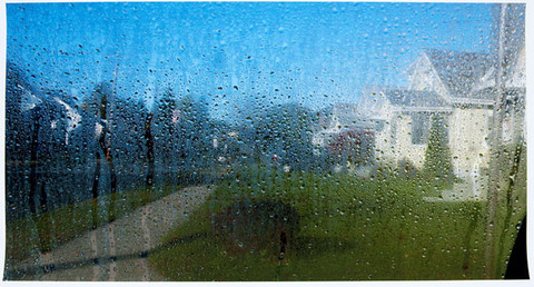 Stuart Shils: Wide View of Suburban Street with Sun Melting Ice on Windshield (2009) Archival pigment print